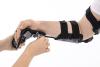 Hinged elbow splint with resting hand orthosis