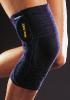 Adjustable knee brace with patellar window