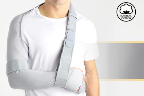 Shoulder and arm brace with elastic sleeve
