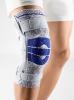 GenuTrain&#x000000ae; S Pro Kniebandage met instelbare kniescharnieren voor zijdelingse stabilisatie