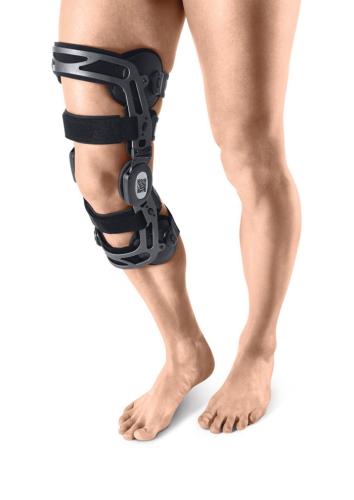 Knee orthosis for dynamic relief and stabilisation of the medial or lateral compartment individual relief Genudyn OA